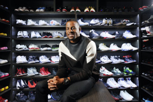 The Golden State Warrior's Andre Iguodala poses for a portrait in his large walk-in shoe closet at his home in Berkeley, CA, on Thursday, January 8, 2015.